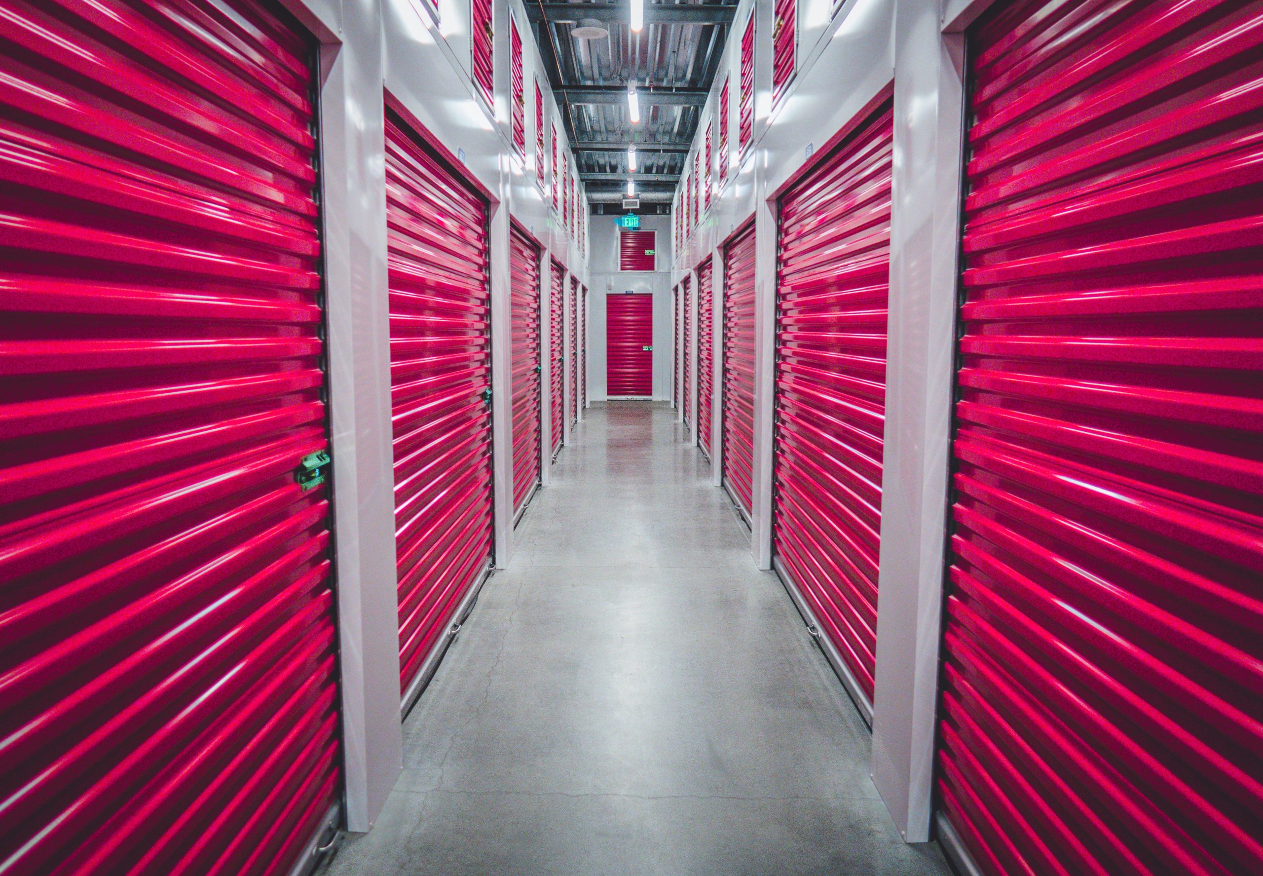 Indoor self storage facility with closed red doors