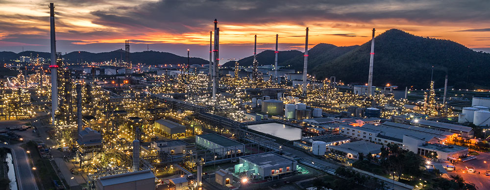 Oil extraction and refining factory during the night