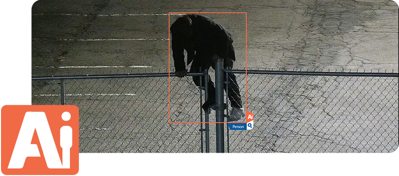 A suspect climbing over a fence is tracked by Caliber's proprietary Artificial Intelligence system