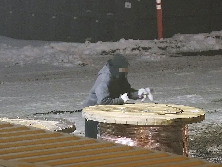 A suspect is captured on camera attempting to steal copper wire from a spool on a critical infrastructure property